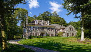 Beech Road house in bryn mawr PA featuring stone façade and 1920s era style exterior